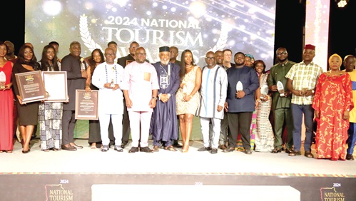 Andrew Egyapa Mercer (5th from left), Minister of Tourism, Arts and Culture, and Akwasi Agyeman (6th from right), CEO, Ghana Tourism Authority, with some of the award winners after the ceremony at the Osu Castle in Accra. Picture: ELVIS NII NOI DOWUONA