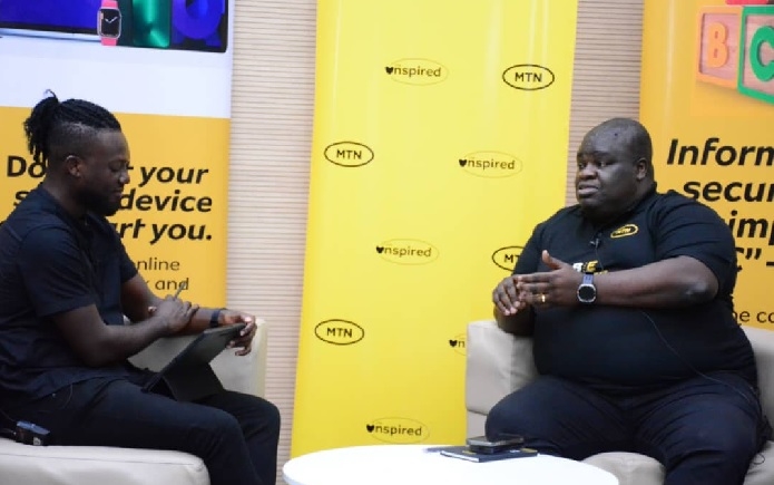 Mr Richard Acquah , chief innovation officer of MTN (right) explaining a point to moderator Koby Spiky Nkrumah (Group Head,EIB Digital)