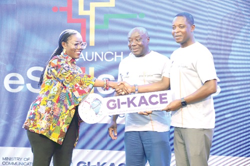 Ursula Owusu-Ekuful (left) being assisted by Kwame Owusu (middle), Board Chairman of Ghana-India Kofi Annan ICT Centre of Excellence (GI-KACE), and Dr Collins Yeboah-Afari (right), DG, GI-KACE, to launch the eSkills4Jobs.  Picture: ELVIS NII NOI DOWUONA