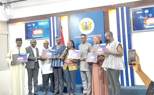 Ursula Owusu-Ekuful (4th from right), Minister of Communications and Digitalisation, together with the other speakers declaring the  launch of the National Cyber Security Awareness Month 2024. 