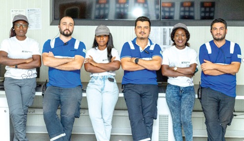Pearl Abrokwah (left),  Assistant Chemical Engineer, Michelle Hazel (3rd from left), Project Manager, and Sandra Amarquaye (2nd from right), Communications Manager, all of Karpowership, with some male engineers of the company