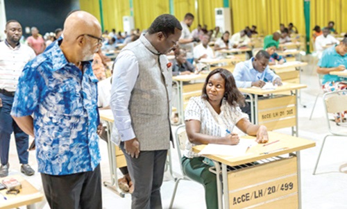  Rev. John Ntim Fordjour (2nd from left), a Deputy Minister of Education, accompanied by Anis Haffar (left), Chairman of the National Teaching Council, during the 2024 Ghana Teacher Licensure Examination at the Accra College of Education