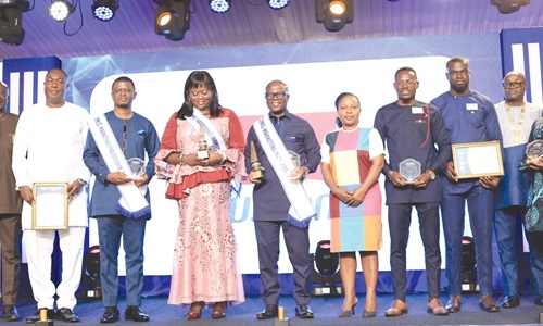  David Eduaful (4th from left), Managing Director, Labadi Beach Hotel, Nana Akua Mensa-Bonsu (3rd from left), Managing Director, Primetime Limited, Dr Daniel Kasser Tee (right), National President, CIMG, and some other awardees after the ceremony