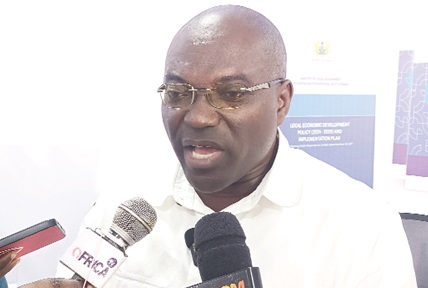  Martin Adjei-Mensah Korsah, the Minister of Local Government, Decentralisation and Rural Development, addressing the media after the launch