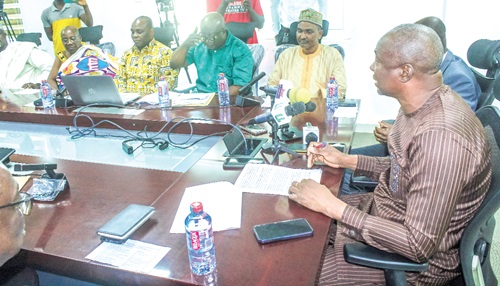 Mohammed Hardi Tufeiru (right),  Deputy Minister of Food and Agriculture in charge of Livestock, launching the programme in Accra