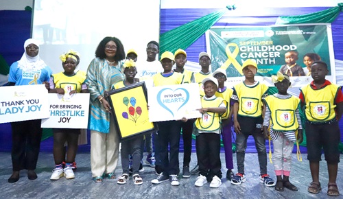 Joy Otabil (3rd from left), and some childhood cancer heroes during the launch Picture: EDNA SALVO KOTEY 
