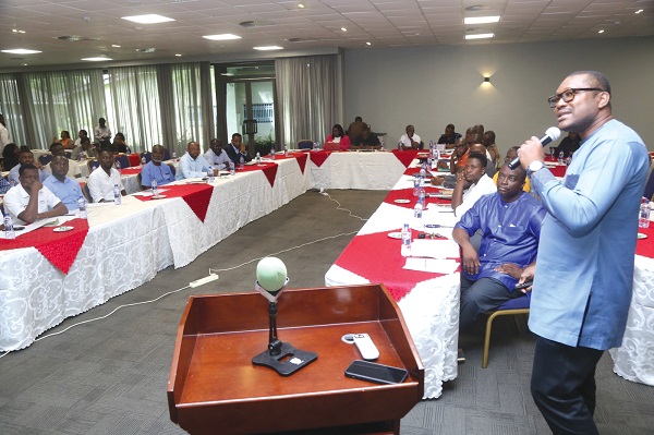 Stephen Yomoh (right), Project Coordinator of the Review of Implementation Guidelines for Electrical Wiring Cables and Electrical Wiring Accessories Regulations, addressing participants in Accra. Picture: SAMUEL TEI ADANO