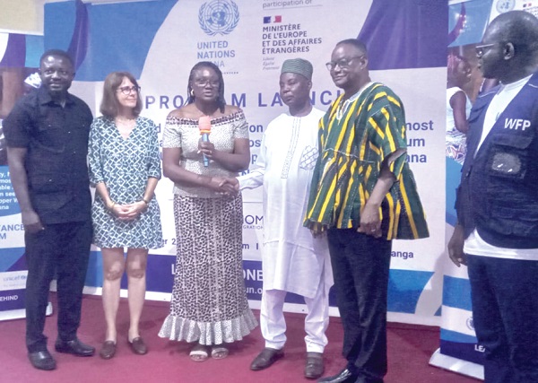 Needa Jehu-Mazou (3rd from left), Head of UNHCR, the UN Refugee Agency Country Office in Ghana, launching the project while other dignitaries look on