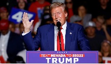 Trump rushed to safety and suspect held after man spotted with rifle
