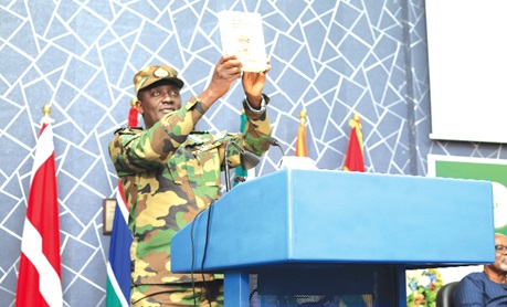  Air Vice Marshall Felix Asante, Deputy Chief of Staff, Administration, launching the autobiography of WOI Joseph Ashitey Hammond