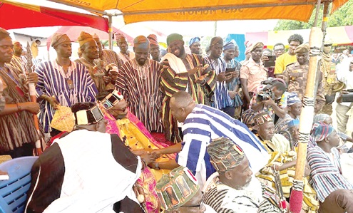 Stephen Asamoah Boateng (back to camera), Minister of Chieftaincy and Religious Affairs, exchanging greetings with Naa Seidu Fuseini Pelpuo IV, the Wa Naa