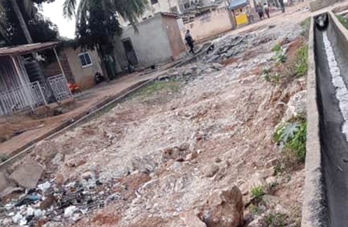  A section of the deplorable town road in  Israel, a suburb of Anyaa Sowutuom