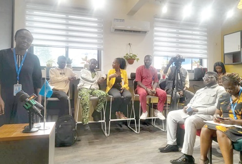 Rhoda Enchil (left), Education Officer, UNICEF Ghana, making a presentation at the media cafe in Accra