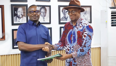 Jabesh Amissah-Arthur (right), former CEO of the Bui Power Authority and Chairman of the Committee, presenting the documents to John Abdulai Jinapor (left), Minister of Energy and Green Transition  Picture: EDNA SALVO KOTEY