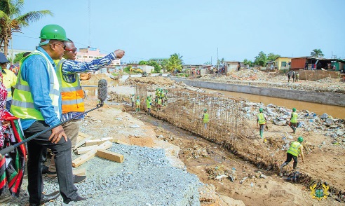 President Mahama inspecting the progress of work on the Achimota storm drain at Abofu