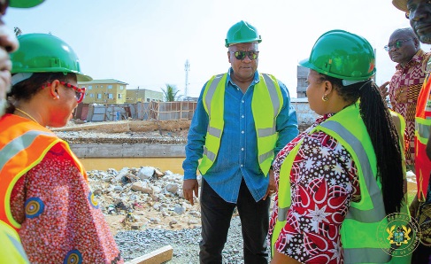 President Mahama conferring with Linda Ocloo (left), Greater Accra Regional Minister, and Theresa Awuni (right), MP for Okaikwei North Constituency, during the inspection of the Achimota storm drain President Mahama conferring with Linda Ocloo (left), Greater Accra Regional Minister, and Theresa Awuni (right), MP for Okaikwei North Constituency, during the inspection of the Achimota storm drain