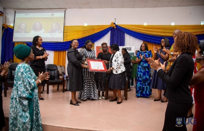 Prof. Akua Kuenyehia (right) receiving the citation