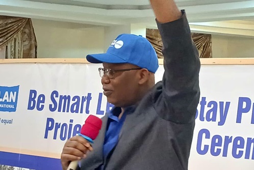 Professor Constant Tchona (right), Country Director of Plan International Ghana, addressing the participants in the closing ceremony in Koforidua