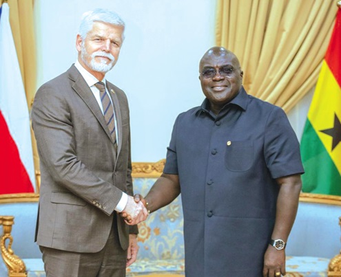 Julius Debrah (right), Chief of Staff, in a handshake with Petr Pavel, President of Czech, during his visit to the Jubilee House 