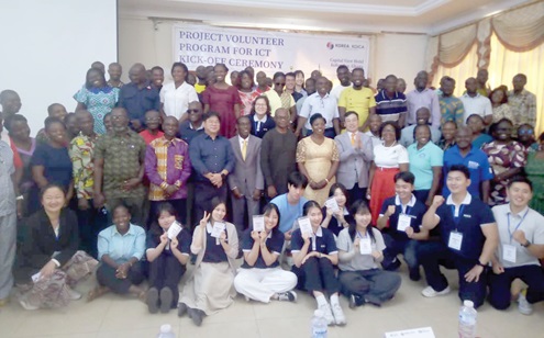 Dong Hyun Lee (middle), Country Director of KOICA,  with the project team members and beneficiary schoolchildren at the launch