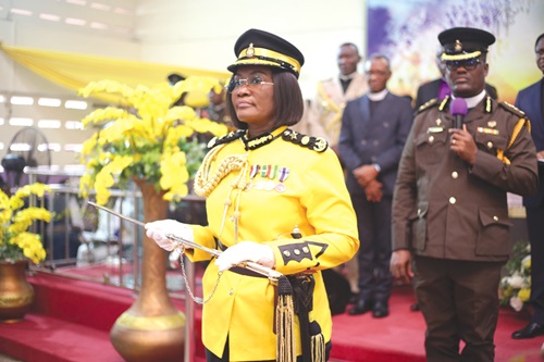 Patience Baffoe-Bonnie, Director-General, Ghana Prisons Service, holding a sword presented to her to symbolise her official committment to her role as Director-General of the Ghana Prisons Service. Picture: BENEDICT OBUOBI