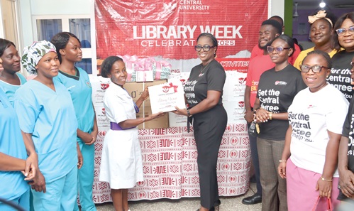 Francisca Yaba Asante (3rd from right), acting University Librarian, Central University, presenting the items to Constance Offei (3rd from left), Deputy Chief Nursing Officer, Korle Bu Child Health OPD. Picture: ELVIS NII NOI DOWUONA 