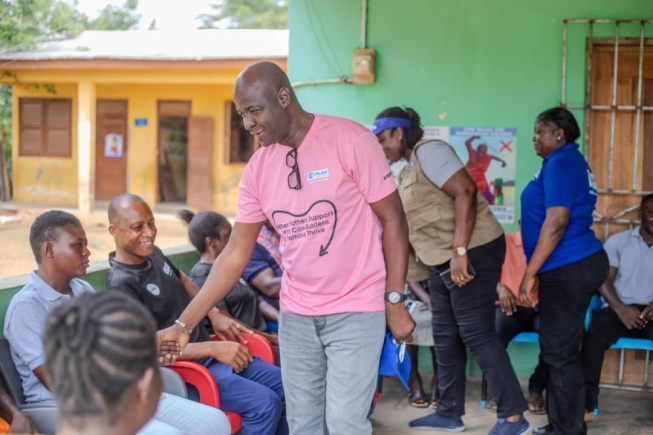 Abubakari Adamu, the Child  Protection and Safeguarding Specialist of Plan International Ghana, leading a delegation from his outfit to greet the opinion leaders and traditional authorities of Atonkor during the visit
