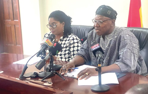 Dr Clement Apaak (right) briefing journalists on the free sanitary pad programme