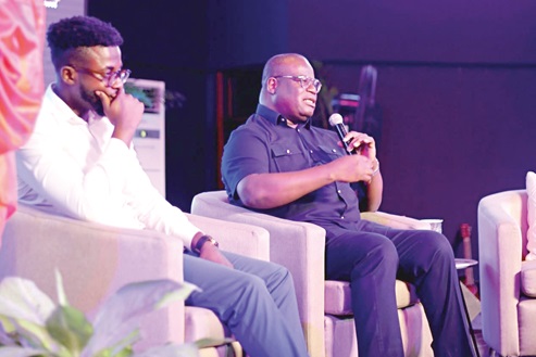 Theophilus Yartey (right),  Editor Graphic, speaking in the event