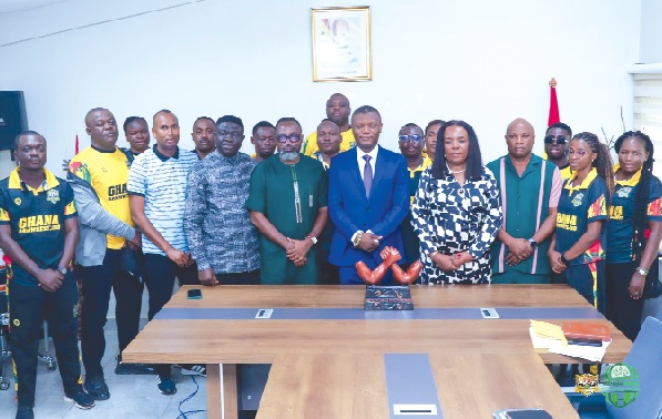 • Kofi Adams (arrowed), Minister for Sports and Recreation, with the GAF Leadership and members of the Golden Arms