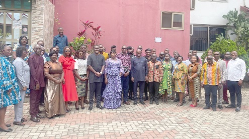 Rita Naa Odoley Sowah (arrowed), Deputy Minister of Local Government, Chieftaincy and Religious Affairs, with participants in the validation workshop
