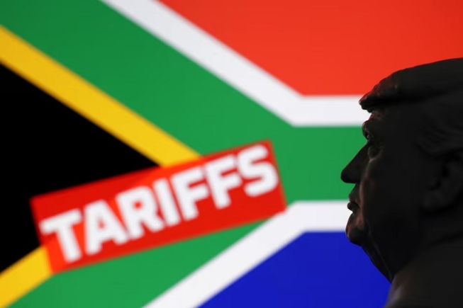 A 3D-printed miniature model of U.S. President Donald Trump, the South Africa flag and the word "Tariffs" are seen in this illustration taken July 23, 2025. REUTERS/Dado Ruvic/Illustration/ File Photo