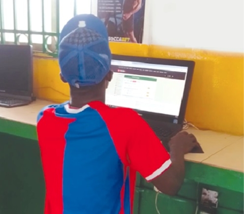 A young boy at a betting centre