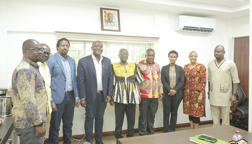 George Abradu-Otoo (middle), CEO of NAFCO, with officials from the three institutions after the meeting