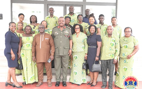 Lieutenant General William Agyapong (4th from left), Chief of the Defence Staff, with management and students of Effiduase Senior High Commercial School