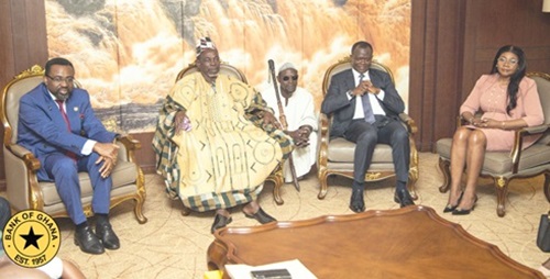 Dr Johnson Asiama (left), Governor, BoG, and his team with the Yagbon Wura