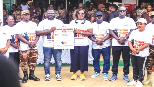 Patience Baffoe-Bonnie (4th from right), Director-General of the Ghana Prisons Service and Dr Frank Amoakohene (3rd from left), Ashanti Regional Minister, launching the Think Prisons 360 Initiative while other senior Officers of the service look on