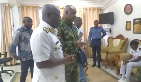Commodore Samuel Ayelazono (left), the Flag Officer Commanding, Western Naval Command, and Air Commodore Eric Yirenkyi (middle), the Base Commander, Air Force Base, Takoradi, and Joseph Nelson, Western Regional Minister, consoling Naval Lieutenant Ewuradwoa Kumi-Kyereh 