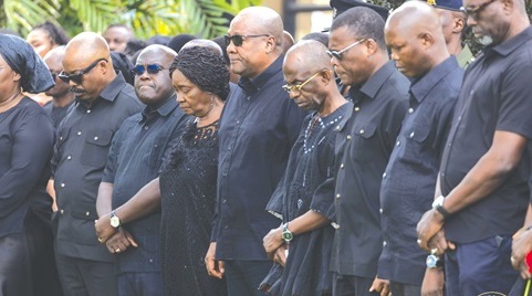 President John Mahama (middle) with Vice-President Prof. Naana Jane Opoku-Agyemang (4th from left), top government officials, and NDC national executives in a solemn mood during the flower-laying ceremony  