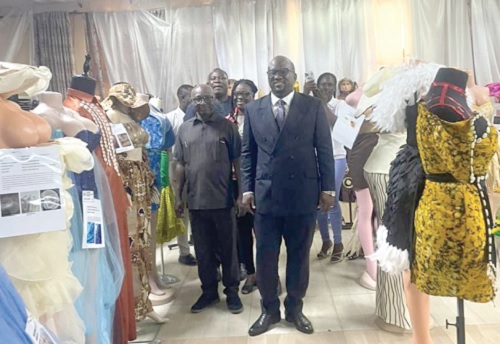 Prof. Amevi Acakpovi (right), acting Vice-Chancellor, Accra Technical University and staff at the exhibition