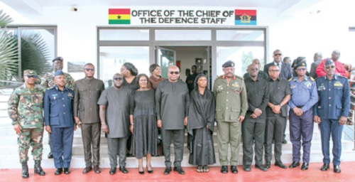 President Mahama (6th from left), Vice-President Prof. Naana Jane Opoku-Agyemang (5th from left), Lt Gen William Agyapong (5th from right), CDS, and other dignitaries with the widow