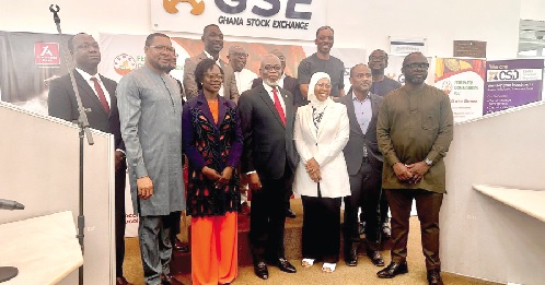 Maria Adamu-Zibo (3rd from right), MD of FEDCO, Abena Amoah (3rd from left), MD, GSE, Dr James Klutse Avedzi, Director-General, Securities and Exchange Commission, and other dignita­ries at the listing of FEDCO’s instrument