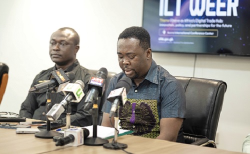 Dr. Mark Oliver Kevor (right), acting Director- General, National Information Technology Agency, explaining a point to participants in the press launch. With him is Yaw Buadu Osei, acting Director, Finance and Administration, NITA