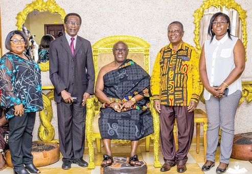 Prof. Samuel K. Afrane (2nd from left), Vice-Chancellor, CSU; Andrews K. Doku (2nd from right), Registrar, and other senior officials of the university with Akyamfour Asafo Boakye Agyemang-Bonsu (middle), Asafohene, at his palace