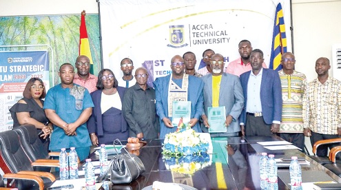 Prof. Amevi Acakpovi (middle), acting Vice Chancellor, ATU, Frederick Kwadwo Asamoah (4th from right), Managing Director, 5 Star Ltd, and other parties after signing the MoU