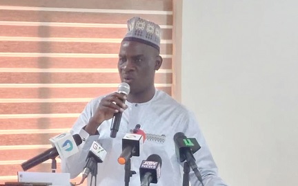 Haruna Iddrisu (left), Minister of Education, speaking at the swearing-in ceremony