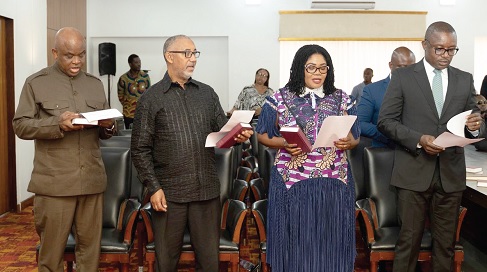 Members of the MiDA board Members of the MiDA board