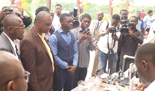 Nii Doodoo Doodoo (2nd from left), Board chairman, CTVET, Abdul Rahman Zakariah (left), Deputy-Director General, CTVET, among other dignitaries being briefed during the exhibition inspection. Picture: BENEDICT OBUOBI