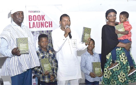 Prof. Jasper Ayelazuno (left), Co-author, and Prof. Abdulai Abdul Gafaru (3rd from left), Reviewer of the book; with the family of Dr Maxwell Akansina Aziabah, Co-author, during the launch of the book