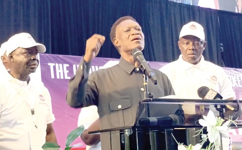 Morgan Ayawine (middle), retained ICU General Secretary, delivering his address 